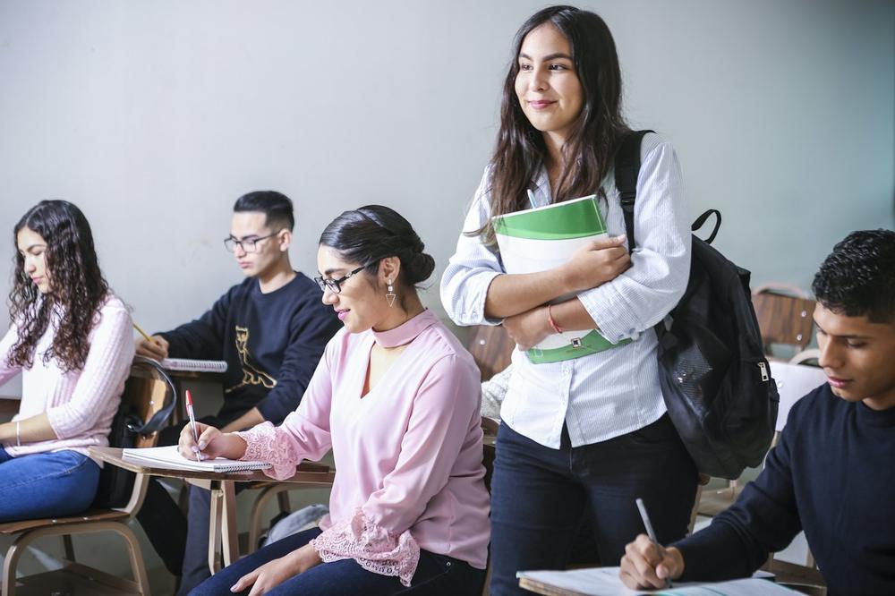 Students taking notes in class