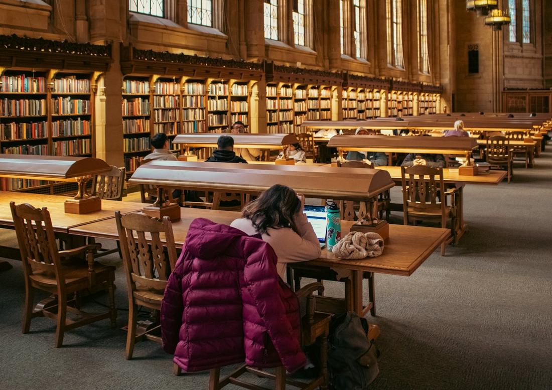 Library reading hall with long tables